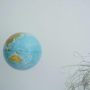 A globe showing the Pacific Ocean and surrounding continents.
